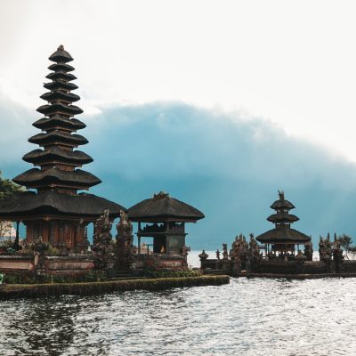 Pura Ulun Danu Bratan, Bali. Hindu temple surrounded by flowers on Bratan lake