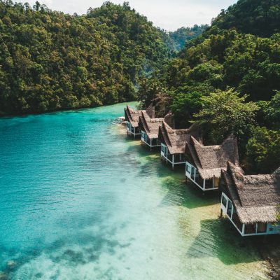 The set of cottages on the ocean under the blue sky